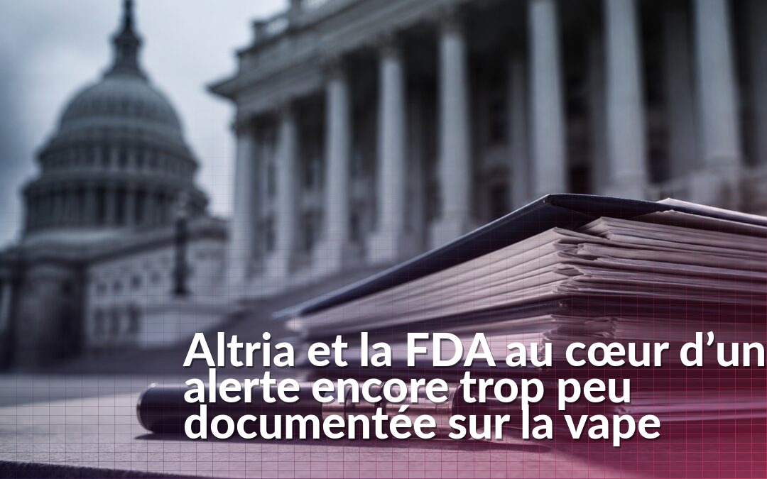 Cigarette électronique devant des dossiers évoquant l’alerte visant Altria et la FDA